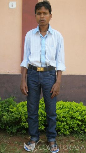 Satish stands after eight months of paralysis.