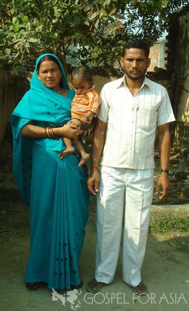 Lanal and his family, who now attend a local Gospel for Asia-supported church because of a drink of clean water from a Jesus Well.