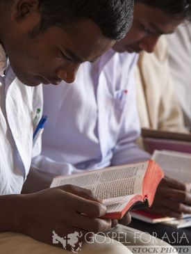 Student reads in Bible College