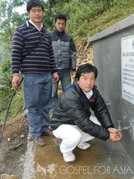 Men getting water - Gospel for Asia - KP Yohannan