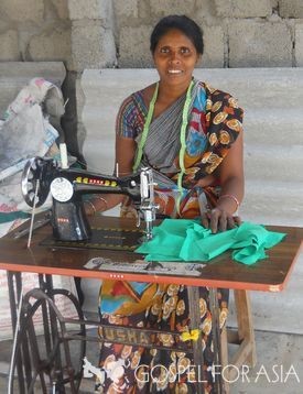 Widow earns an income through sewing machines.