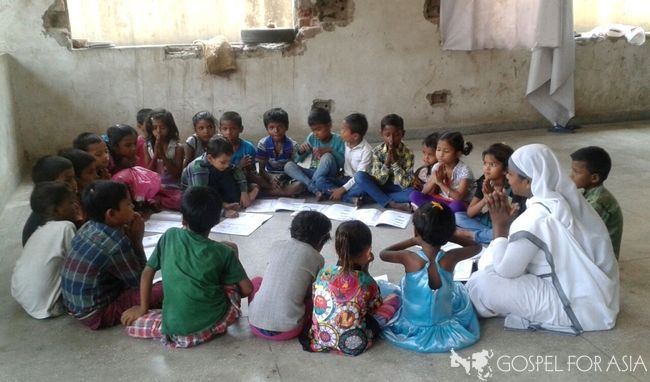 Slum children receiving education
