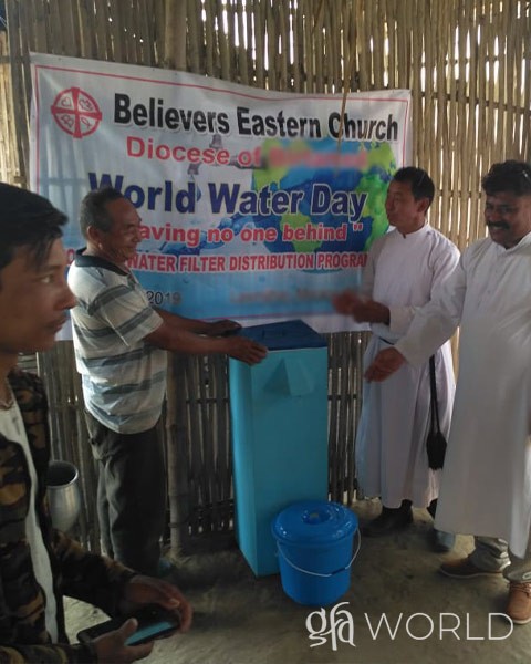 GFA Workers give gift of water filters to provide clean water and fight the water crisis.