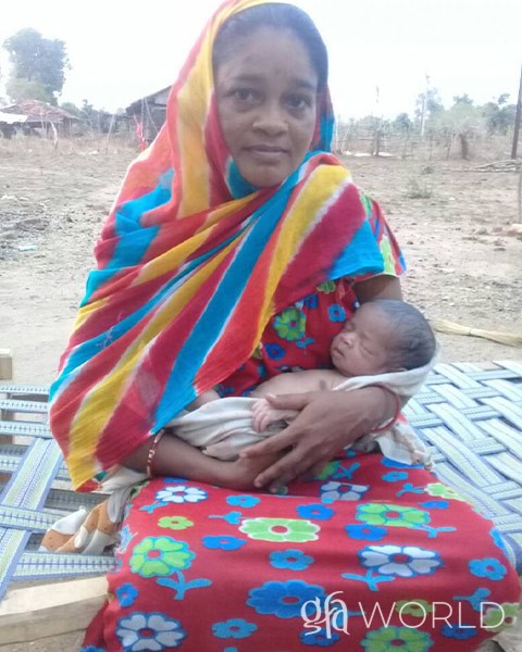 Woman with a new born baby