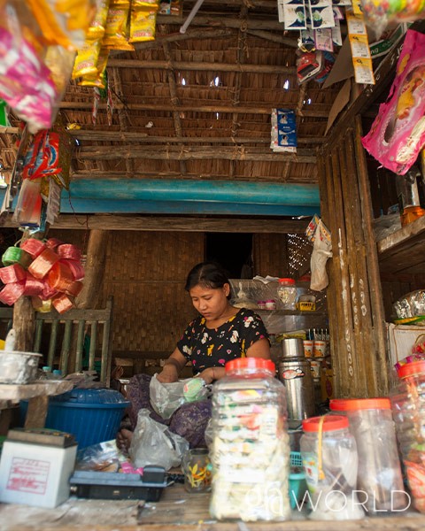 Woman pictured working in her small shop.
