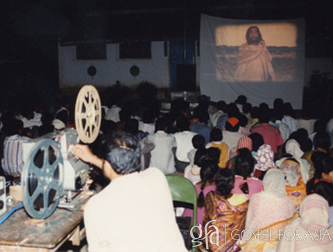 Villagers gather to watch Jesus film