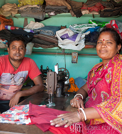Couple with sewing machine