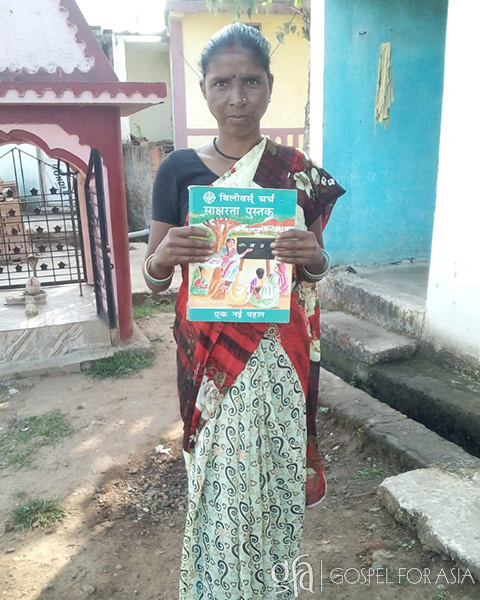 woman receives literacy training through GFA